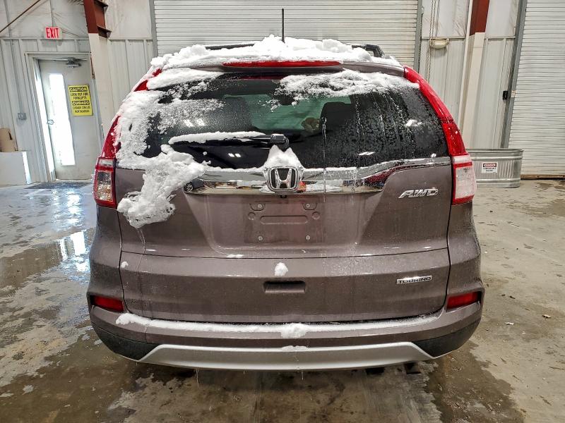 Photo 6 from auction – 2016 HONDA CR-V TOURI with VIN 5J6RM4H93GL095923