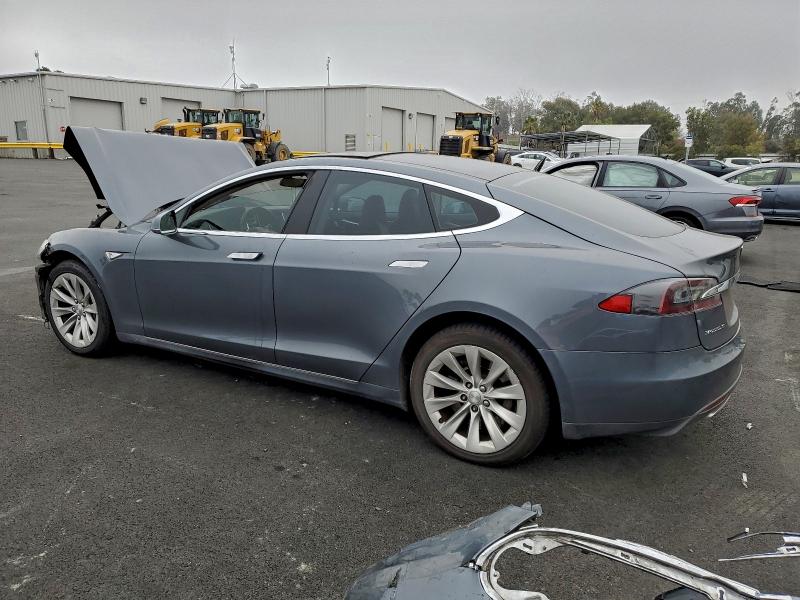 Photo 2 from auction – 2014 TESLA MODEL S with VIN 5YJSA1S13EFP32729