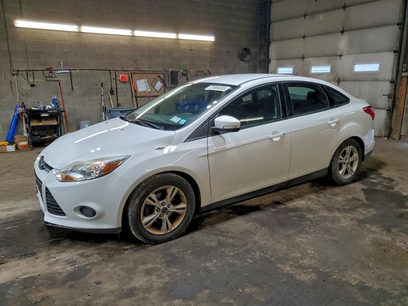 FORD FOCUS SE 2014 with VIN 1FADP3F24EL418371 - Photo from auction