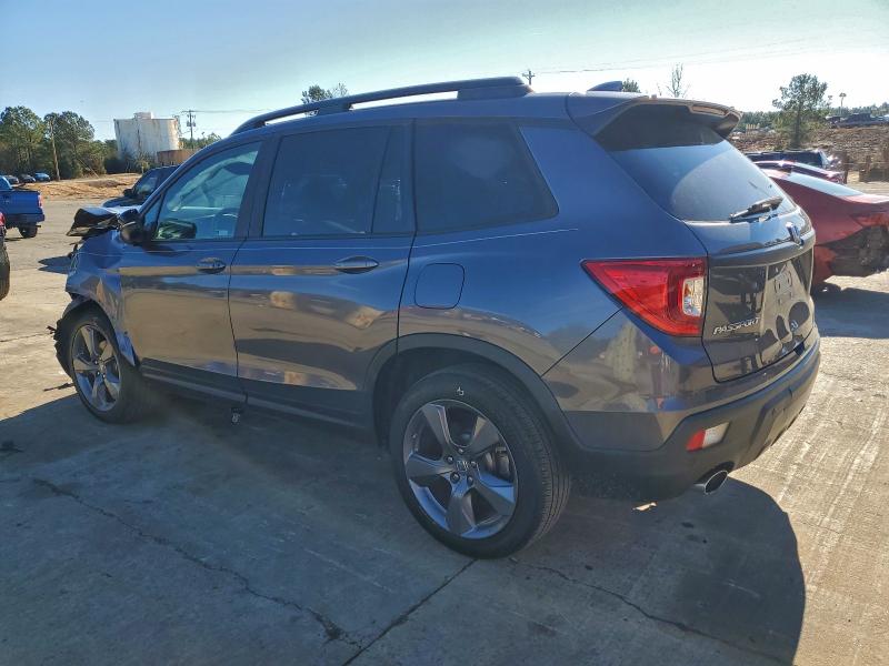 Photo 2 from auction – 2020 HONDA PASSPORT T with VIN 5FNYF7H97LB004792
