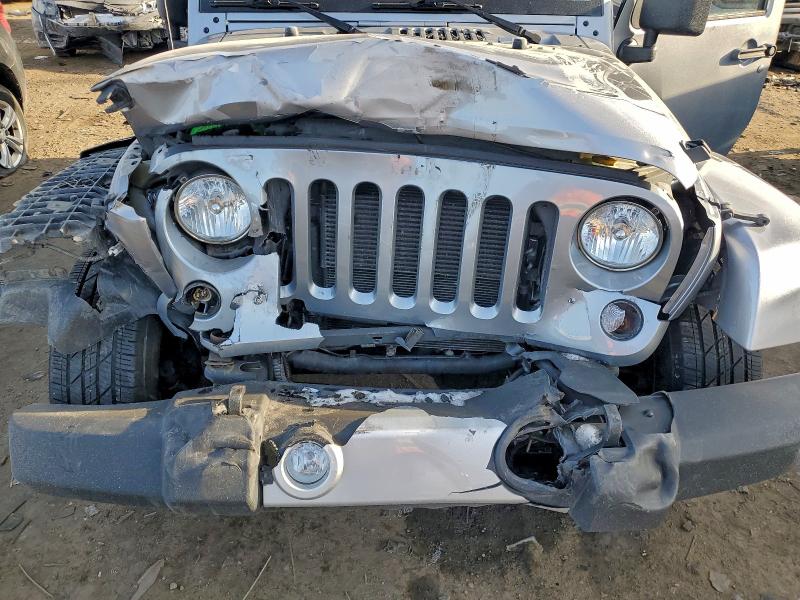 Photo 11 from auction – 2015 JEEP WRANGLER S with VIN 1C4AJWBG7FL631088