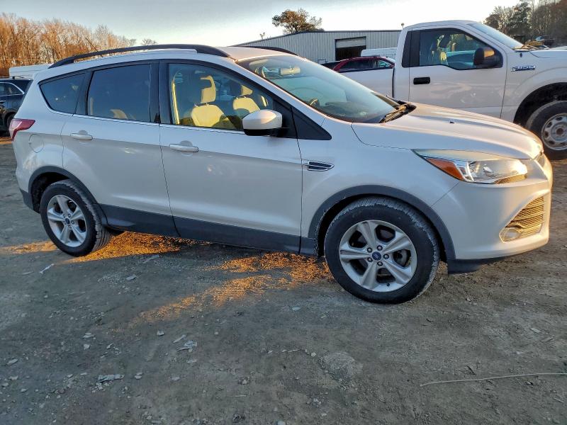 Photo 4 from auction – 2014 FORD ESCAPE SE with VIN 1FMCU0GX7EUC90284