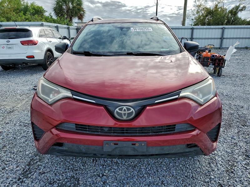 Photo 5 from auction – 2018 TOYOTA RAV4 LE with VIN JTMBFREV1JD225750