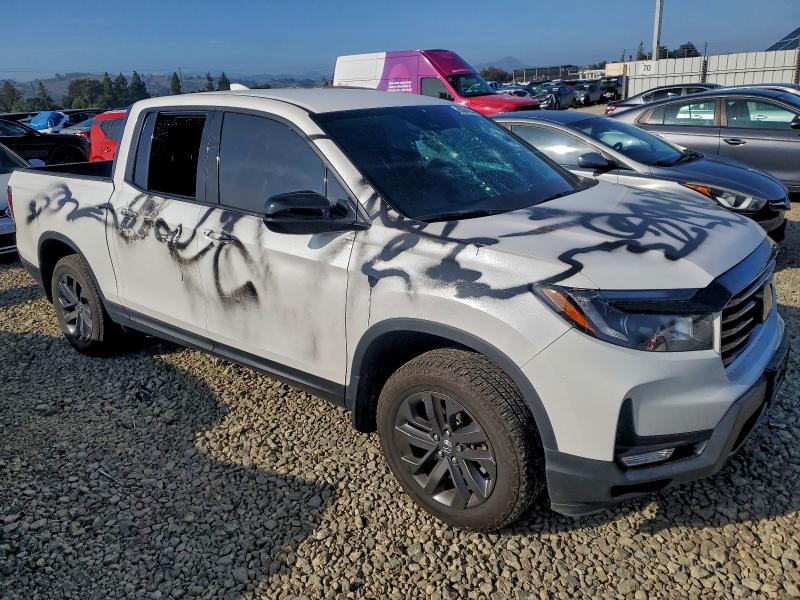 Photo 4 from auction – 2023 HONDA RIDGELINE with VIN 5FPYK3F10PB057347