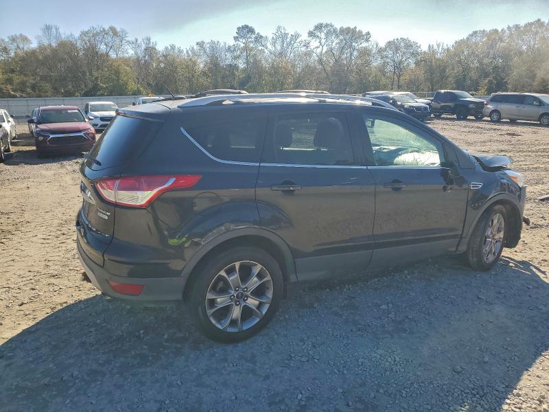 Photo 3 from auction – 2014 FORD ESCAPE with VIN 1FMCU0JX3EUD48559
