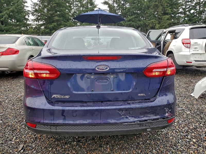 Photo 6 from auction – 2017 FORD FOCUS SEL with VIN 1FADP3H22HL314950