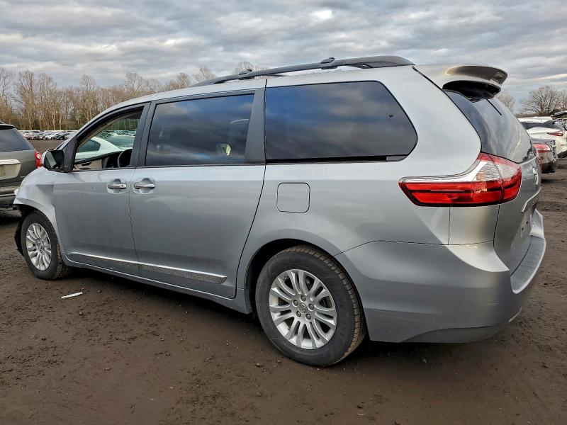 Photo 2 from auction – 2015 TOYOTA SIENNA XLE with VIN 5TDYK3DC0FS646695