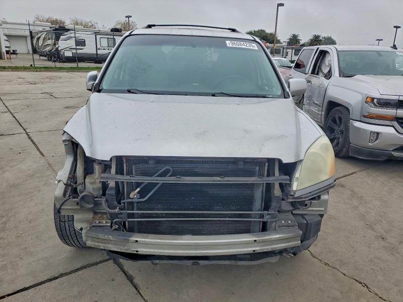 Photo 5 from auction – 2004 HONDA PILOT EXL with VIN 2HKYF18564H533745