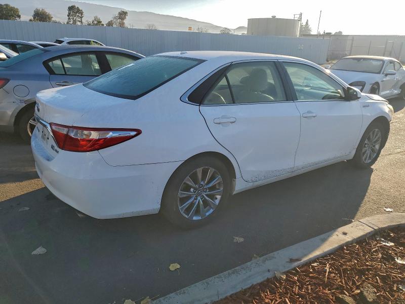 Photo 3 from auction – 2015 TOYOTA CAMRY HYBR with VIN 4T1BD1FK2FU153746