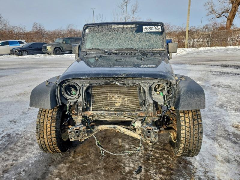 Photo 5 from auction – 2015 JEEP WRANGLER S with VIN 1C4AJWAG5FL735385