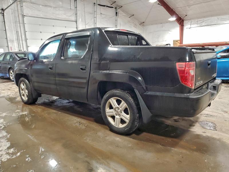 Photo 2 from auction – 2011 HONDA RIDGELINE with VIN 5FPYK1F5XBB006437