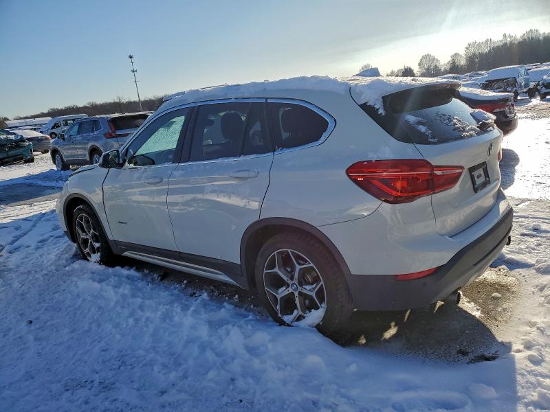 Photo 2 from auction – 2018 BMW X1 XDRIVE2 with VIN WBXHT3Z33J4A65935