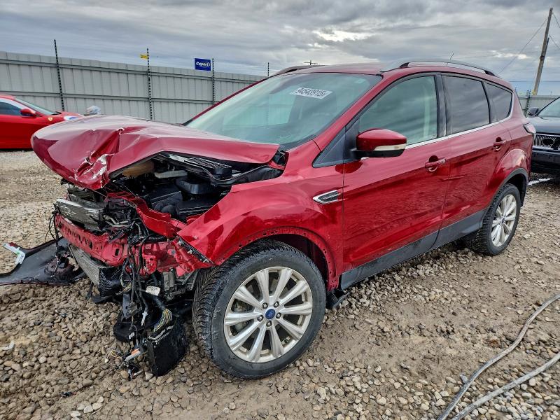 FORD ESCAPE TIT 2017 with VIN 1FMCU9J90HUC34495 - Photo from auction