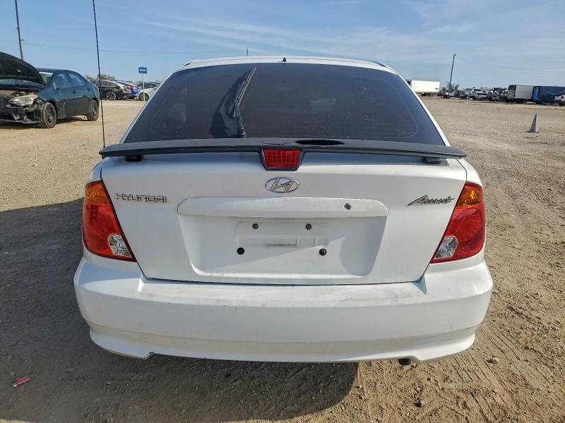 Photo 6 from auction – 2004 HYUNDAI ACCENT GL with VIN KMHCG35C04U285872