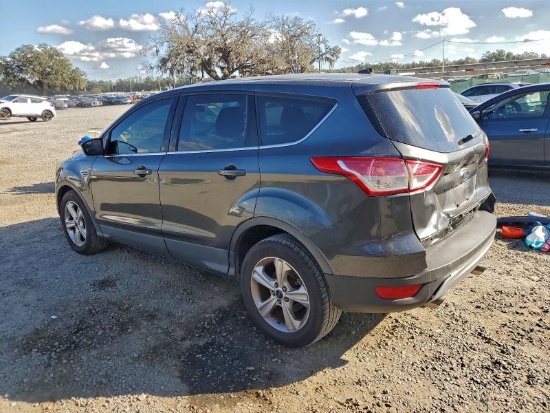 Photo 2 from auction – 2016 FORD ESCAPE SE with VIN 1FMCU0G73GUB04145