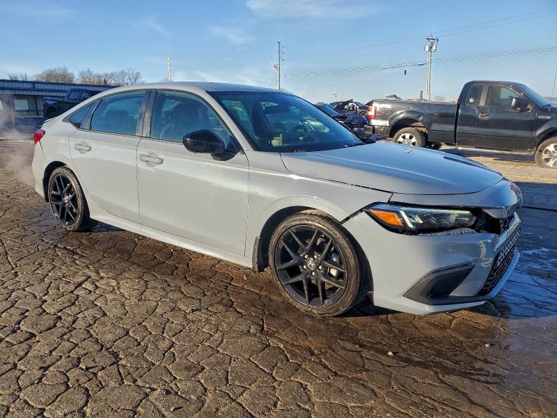 Photo 4 from auction – 2023 HONDA CIVIC SPOR with VIN 2HGFE2F52PH530035