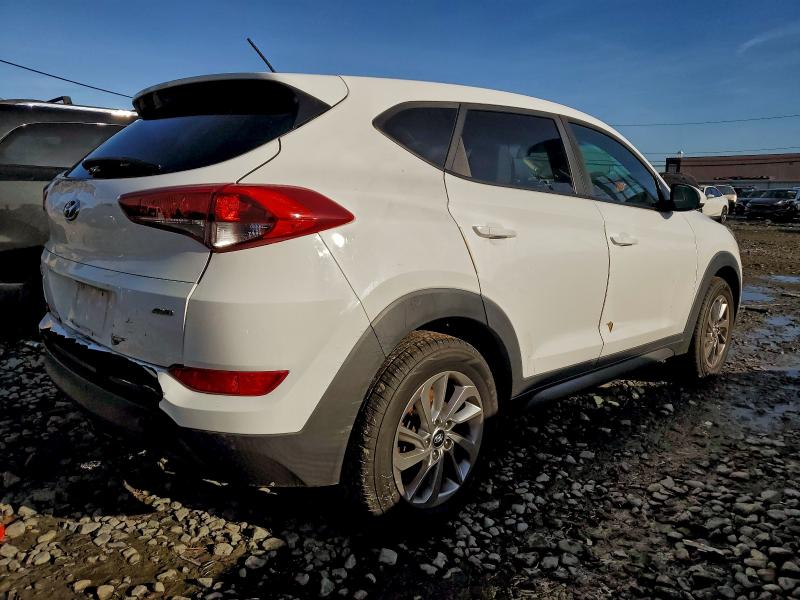 Photo 3 from auction – 2018 HYUNDAI TUCSON SE with VIN KM8J2CA43JU684517