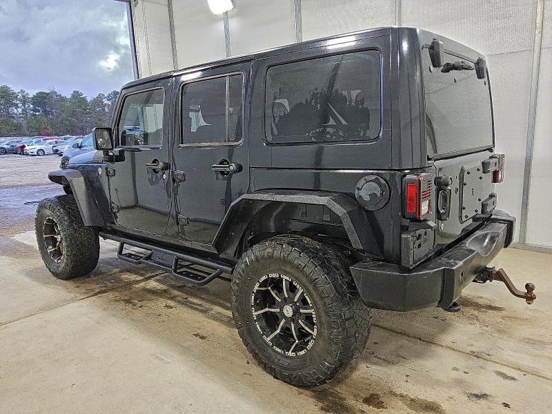 Photo 2 from auction – 2011 JEEP WRANGLER U with VIN 1J4BA3H15BL579244