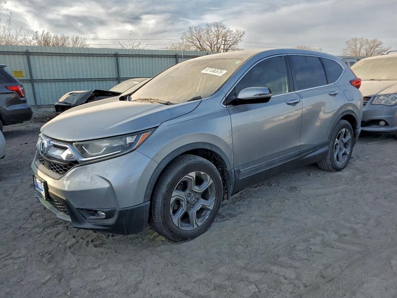 Photo 1 from auction – 2018 HONDA CR-V with VIN 7FARW1H88JE003287
