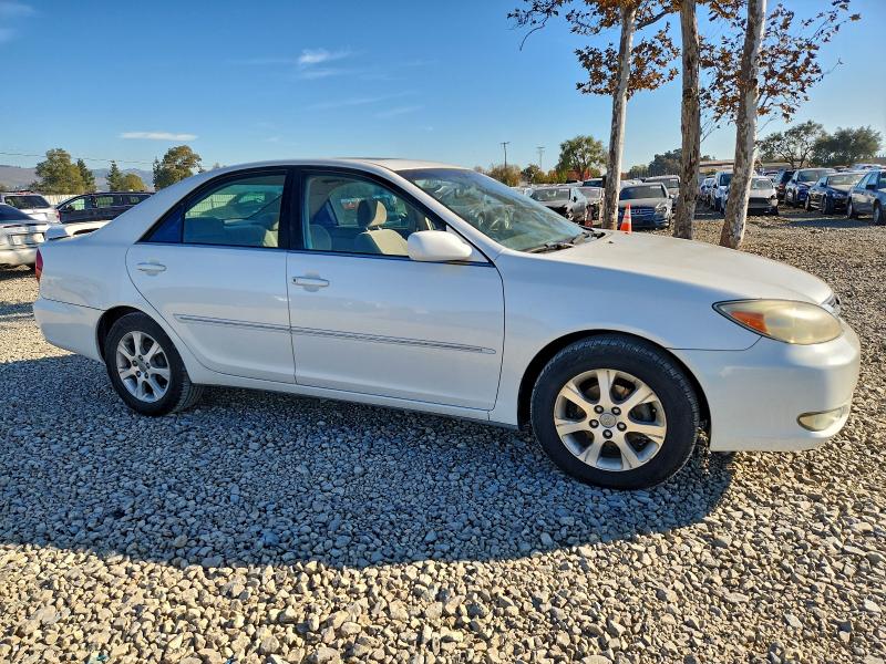 Photo 4 from auction – 2004 TOYOTA CAMRY LE with VIN JTDBE32K640284234