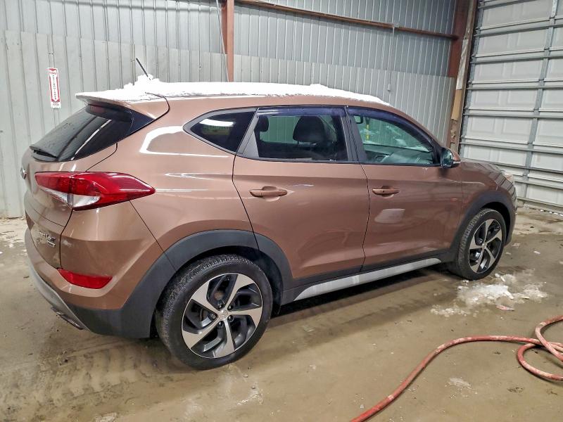 Photo 3 from auction – 2017 HYUNDAI TUCSON LIM with VIN KM8J3CA29HU472081