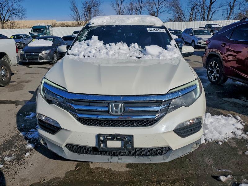 Photo 5 from auction – 2016 HONDA PILOT EXL with VIN 5FNYF6H67GB021646
