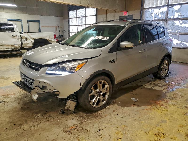 FORD ESCAPE TIT 2014 with VIN 1FMCU0JX4EUC98965 - Photo from auction