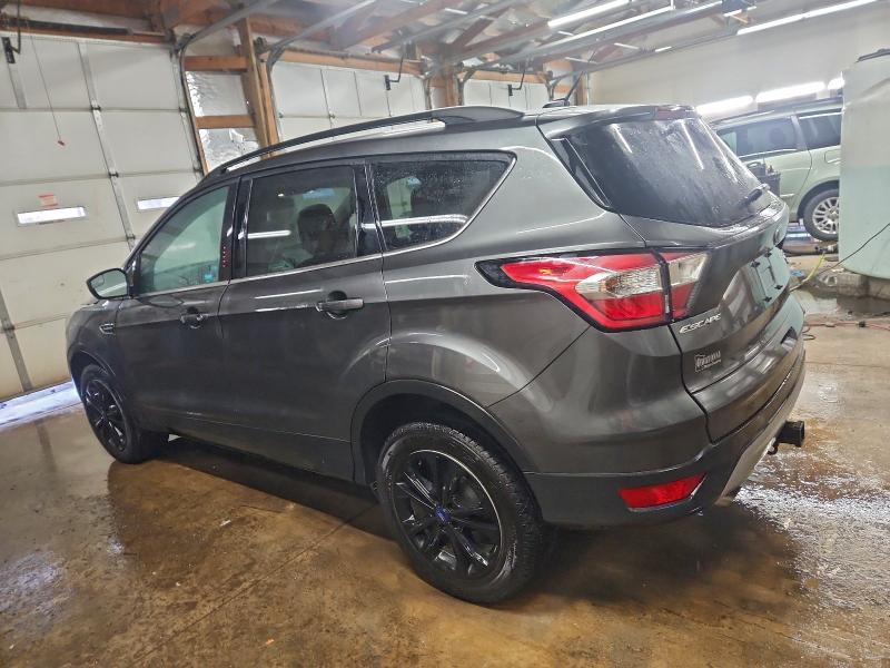 Photo 2 from auction – 2018 FORD ESCAPE with VIN 1FMCU9GD1JUA23713