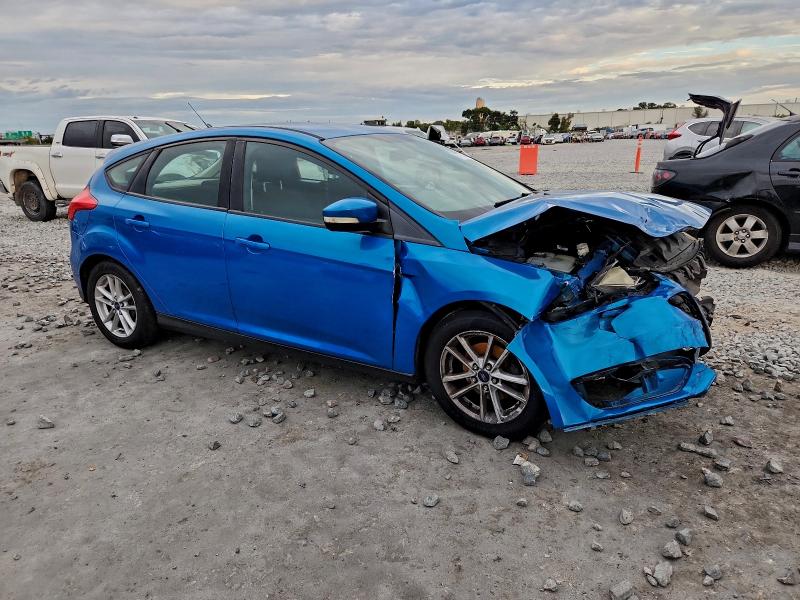 Foto 4 de la subasta – 2015 FORD FOCUS SE con VIN 1FADP3K21FL252950