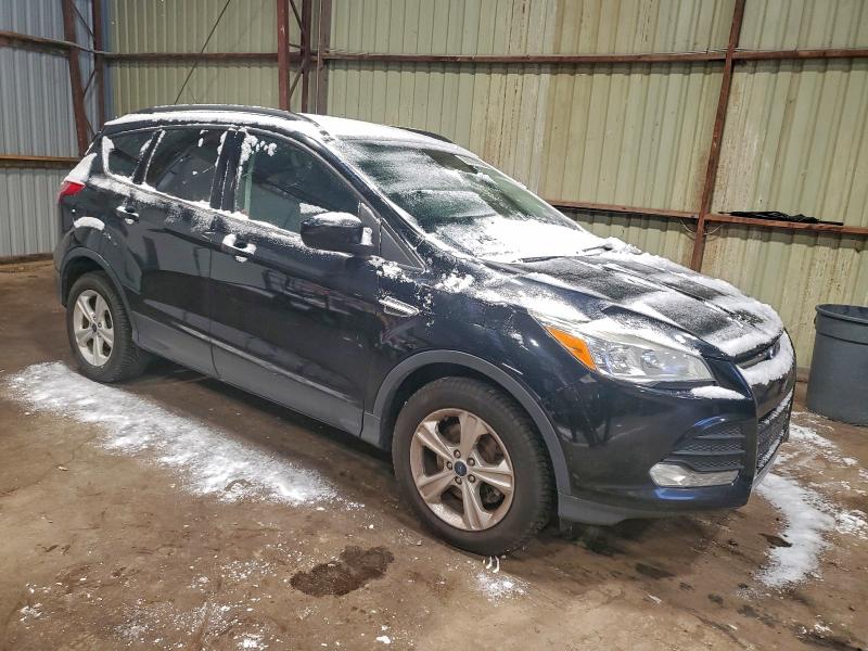 Photo 4 from auction – 2016 FORD ESCAPE SE with VIN 1FMCU9GX2GUA56965