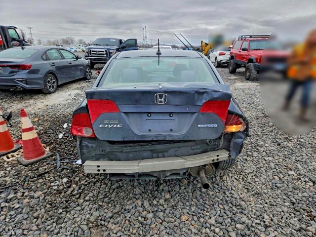 Photo 6 from auction – 2007 HONDA CIVIC HYBR with VIN JHMFA36287S005591