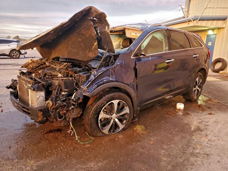 KIA SORENTO EX 2016 with VIN 5XYPH4A14GG009097 - Photo from auction