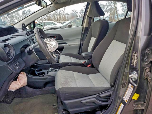Photo 7 from auction – 2014 TOYOTA PRIUS C with VIN JTDKDTB3XE1061587