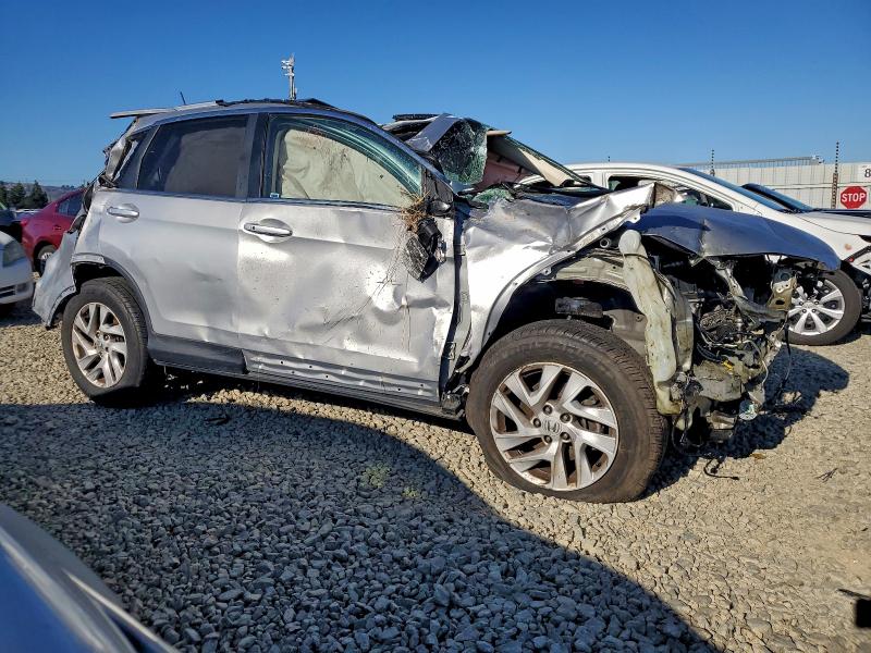 Photo 4 from auction – 2015 HONDA CR-V EXL with VIN 2HKRM3H79FH531028