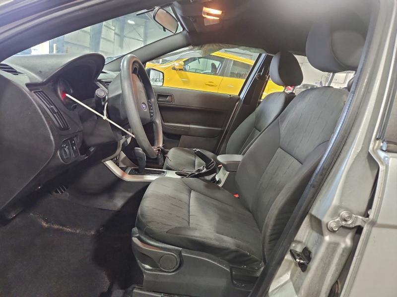 Photo 7 from auction – 2011 FORD FOCUS SE with VIN 1FAHP3FNXBW112636
