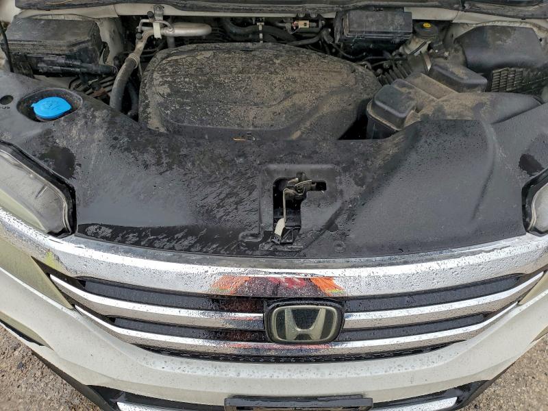 Фото 12 с аукциона – 2016 HONDA PILOT с VIN 5FNYF6H95GB039427
