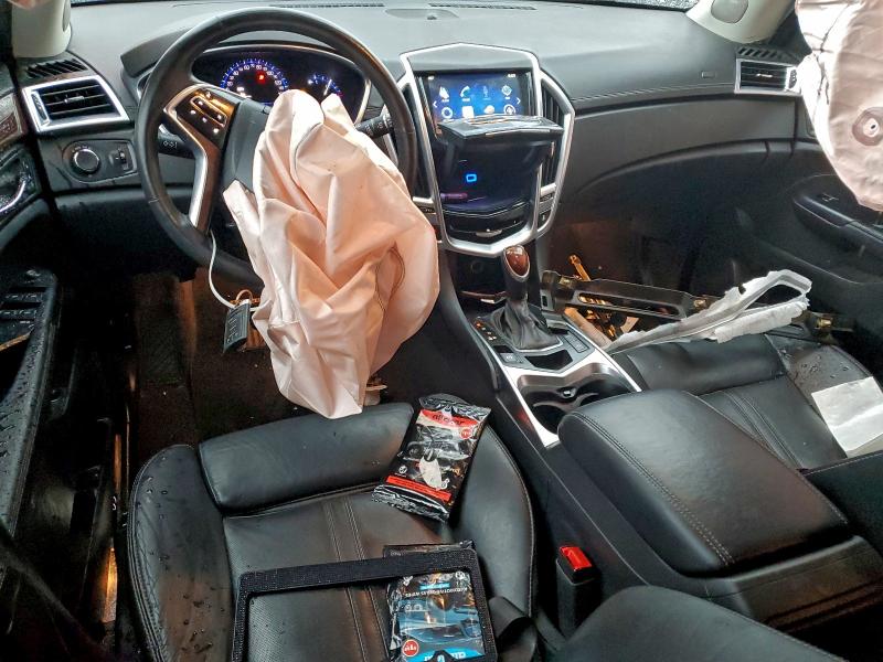 Photo 8 from auction – 2014 CADILLAC SRX LUXURY with VIN 3GYFNEE39ES587496