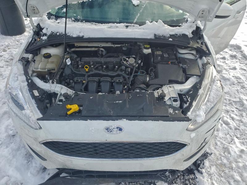 Photo 11 from auction – 2018 FORD FOCUS SE with VIN 1FADP3F29JL212036