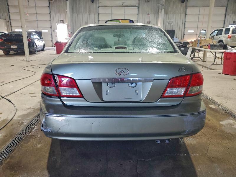 Photo 6 from auction – 2002 INFINITI I35 with VIN JNKDA31AX2T014317