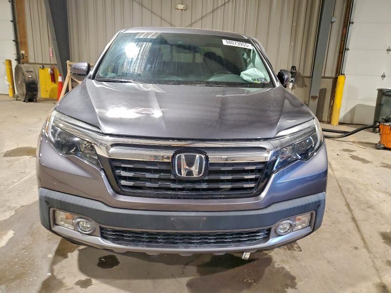 Photo 5 from auction – 2019 HONDA RIDGELINE with VIN 5FPYK3F74KB004339