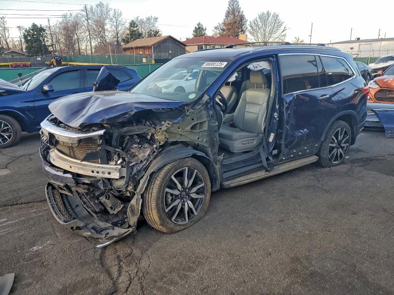 HONDA PILOT ELIT 2019 with VIN 5FNYF6H07KB008352 - Photo from auction