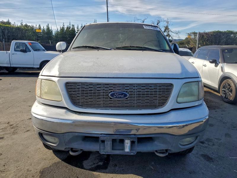 Photo 5 from auction – 2002 FORD F150 with VIN 1FTRX18W92KE31090