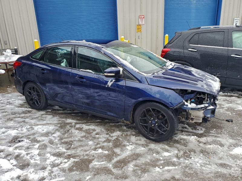 Photo 4 from auction – 2016 FORD FOCUS SE with VIN 1FADP3F25GL305175