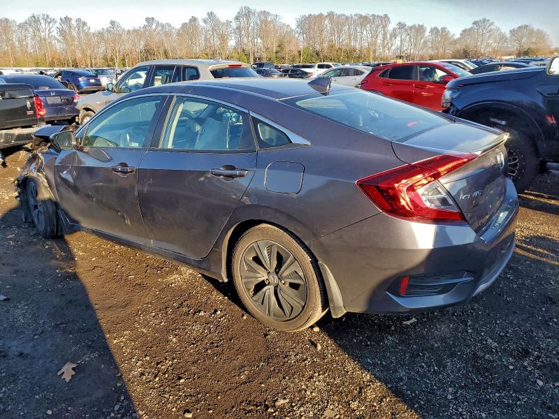 Photo 2 from auction – 2021 HONDA CIVIC with VIN 19XFC1F74ME200484