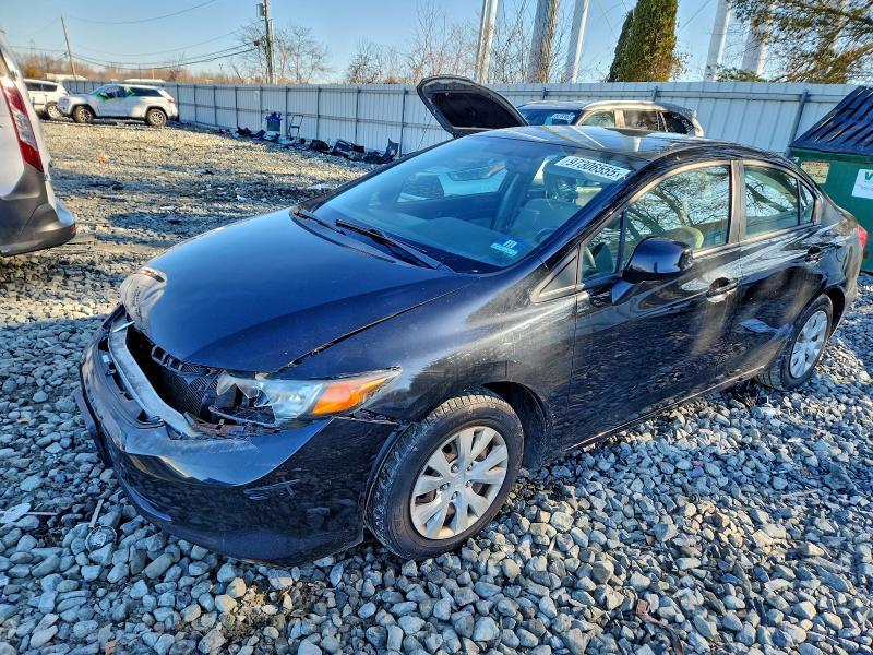HONDA CIVIC LX 2012 with VIN 19XFB2F53CE385004 - Photo from auction