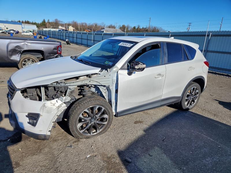 MAZDA CX-5 GT 2016 with VIN JM3KE4DY6G0791945 - Photo from auction