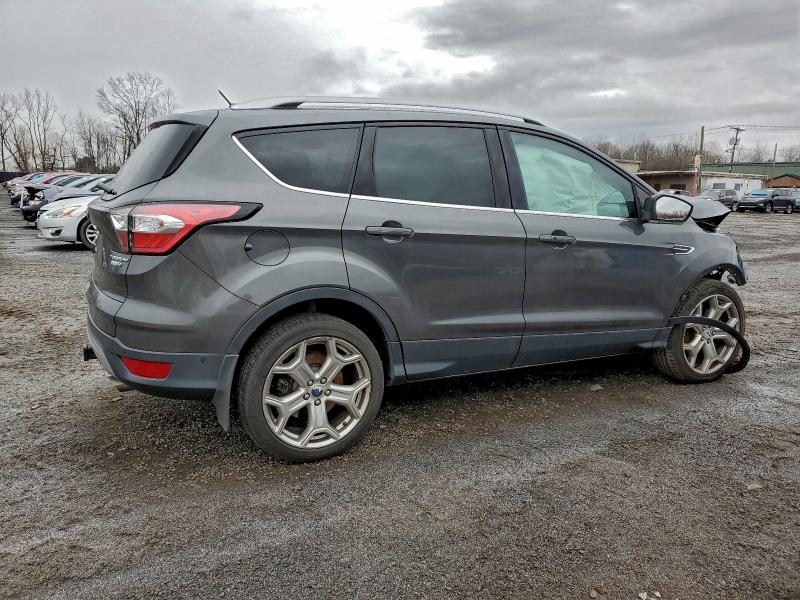 Photo 3 from auction – 2017 FORD ESCAPE TIT with VIN 1FMCU9J90HUC70784