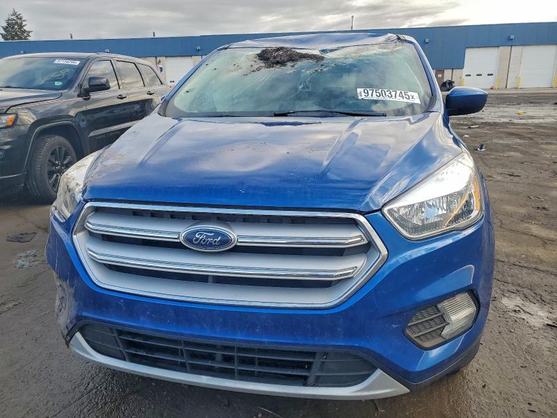 Photo 5 from auction – 2019 FORD ESCAPE with VIN 1FMCU9GD8KUC01019