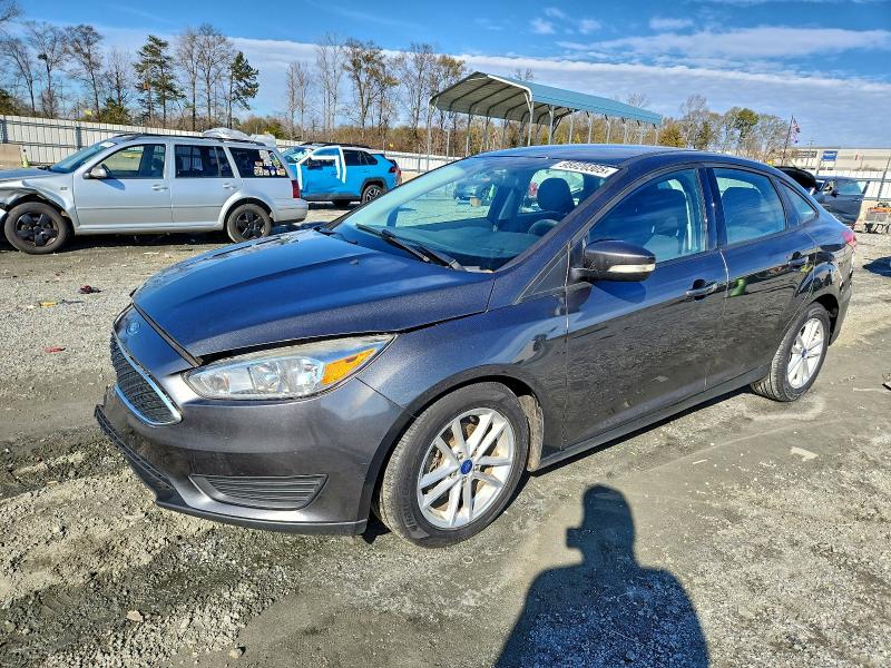 FORD FOCUS SE 2017 with VIN 1FADP3F28HL337216 - Photo from auction