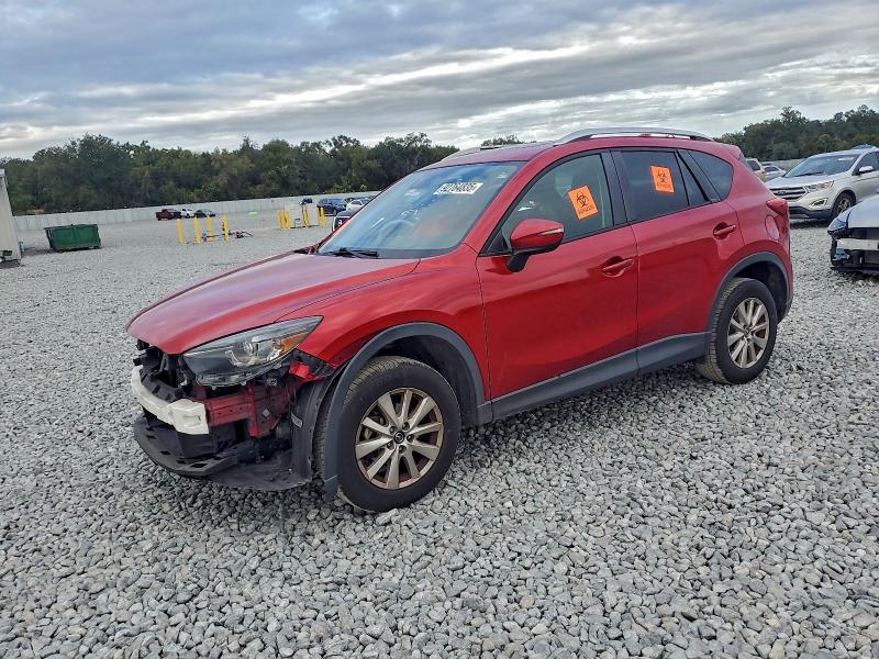 MAZDA CX-5 TOURI 2016 with VIN JM3KE2CY0G0713358 - Photo from auction